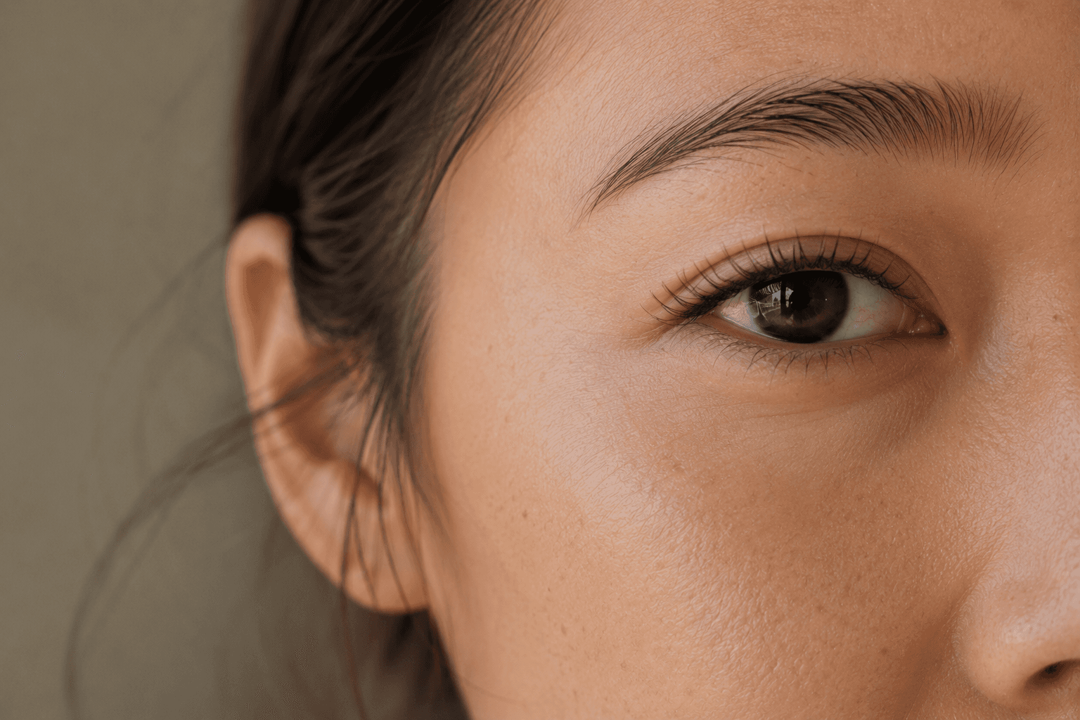 Close detail of a Korean lash lift treatment in progress